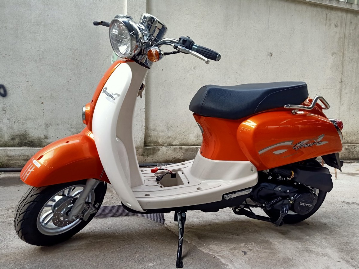 Thiết nối tiếp tinh xảo - thon gọn với xe máy tay ga 50cc Scoopy